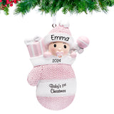 Baby girl in mitten ornaments for first Christmas, a delightful keepsake to celebrate her Christmas.