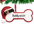 Personalized Christmas ornament dog bone with Santa hat, a festive keepsake.