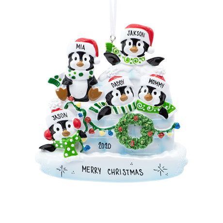 Celebrate togetherness with a personalized family Christmas ornament featuring a penguin family.