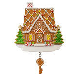 Celebrate new beginnings with a personalized gingerbread house with key ornament.