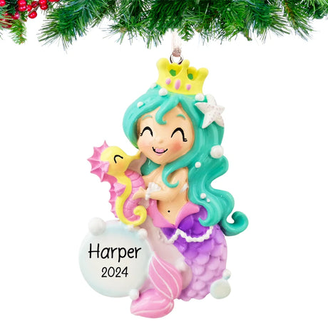 Celebrate the magic of the season with a personalized mermaid Christmas ornament for girls.